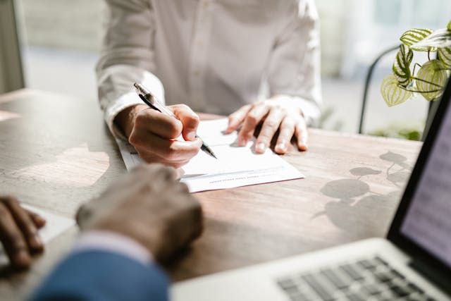 person signing a lease agreement